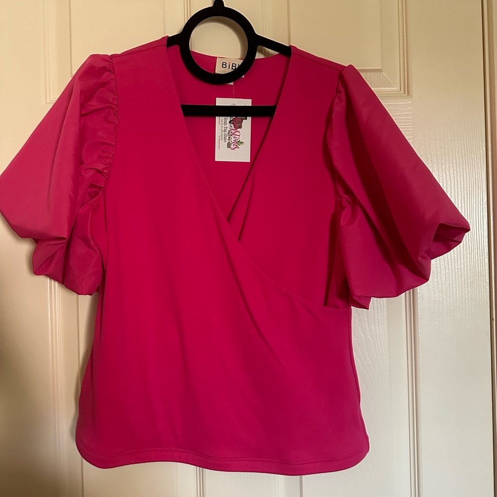 Pink shirt with puff sleeves
